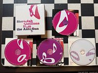 Full contents: slipcase, three CDs, one DVD with sleeves