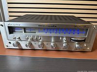 Front view of Marantz 2238B receiver with illuminated dial and meters