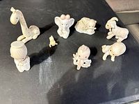 Group view of eight Precious Moments figurines