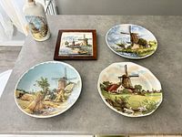Group shot showing all four decorative plates