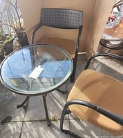 table and two chairs on patio