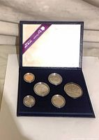 Full view of 6-coin set in open case