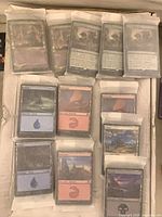 Open box with multiple sealed card bundles visible