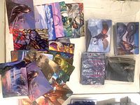 Mixed spread of Dominaria United Art Series cards showing varied artwork