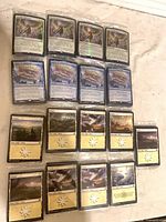 All 17 sealed packs arranged showing card fronts