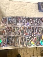 Overview of assorted Topps baseball cards in top loaders