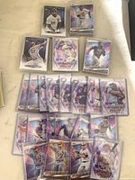 Spread of Topps Stars of MLB cards in sleeves showing multiples