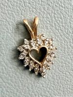 Front view showing open heart center and surrounding diamonds