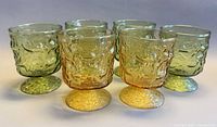 Six footed rocks glasses grouped together, showing color mix and pattern
