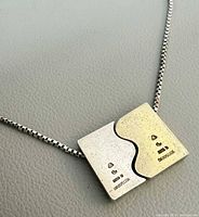 Full view of assembled pendant on box chain