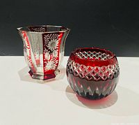 Both crystal pieces side by side showing overall form and color contrast