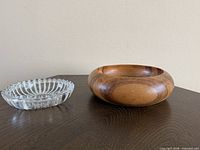 wood bowl and glass ashtray top view