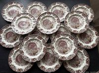 All 16 Johnson Brothers Autumn Monarch plates displayed