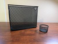 Front view of both organizers, showing size comparison and mesh pattern