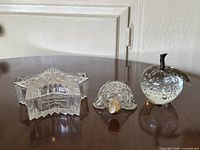 Front view of all three glass items on table