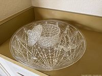 Top view of platter, covered dish and spoons