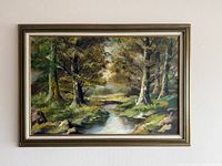 Full view of framed landscape painting