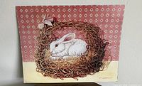 Full view of poster showing rabbit in nest artwork