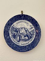 Front view of blue and white Yosemite Falls souvenir plate