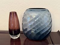 Blue swirl vase and plum bud vase front view