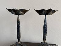 Upper view showing petal-shaped drip pans and stem details