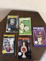 All five magazines laid out on table