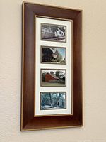 Full view of framed art showing four photos