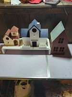 All three birdhouses side by side