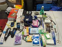 Overall shot of entire lot on table showing health and grooming items