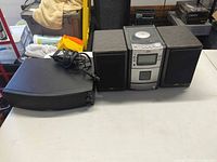 Front view: JVC main unit with two speakers and ZVOX powered speaker