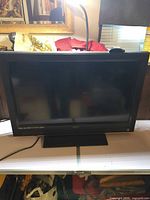 Front view of Vizio 32-inch HDTV on pedestal stand
