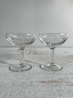 Two Luminarc crystal coupe glasses side-by-side