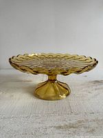 Top and side view of amber Fairfield cake stand