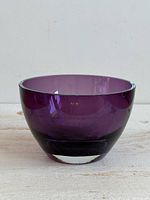 Front view showing purple cased glass bowl with clear base
