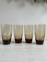 All four Libbey smoky brown highball glasses side by side