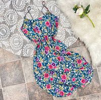 Dress front view laid flat showing full pattern and length