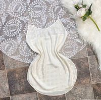 Front view of white coin dot satin slip dress full length