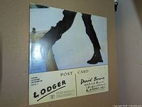 Rear sleeve postcard design with album title and catalog info visible