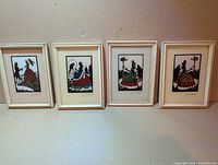 all four framed silhouettes side by side