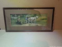 Front view of framed lithograph