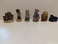 All six Wade figurines lined up