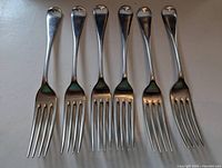 Six forks front view showing tines and handles