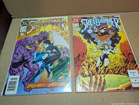 Front covers of both Spelljammer issues #2 and #8 in bags with boards