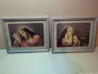 Both framed prints side by side showing overall condition and size