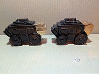 Front side of two brown glass stagecoach bottles