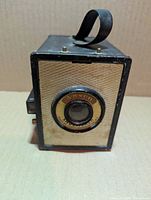 Front view showing lens, faceplate and branding