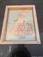 Full view of shadow box showing ribbon art doll and frame