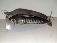 Left side view showing Jitterstick name, body pattern, front prop, rear hook