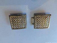 Front view of both square lattice buckle halves