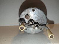 Side view showing crank handle, knobs and overall finish